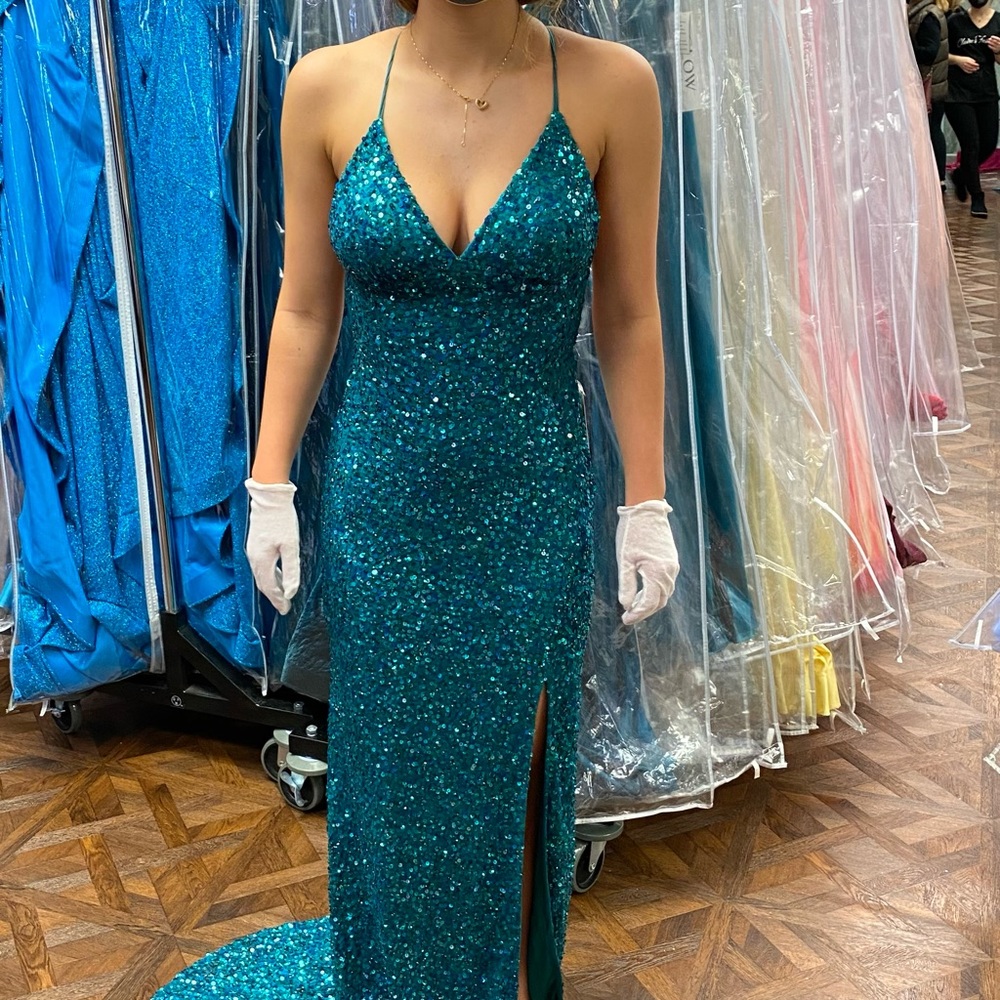 Brand NWT Sequin prom gown. Size 2. Never worn!